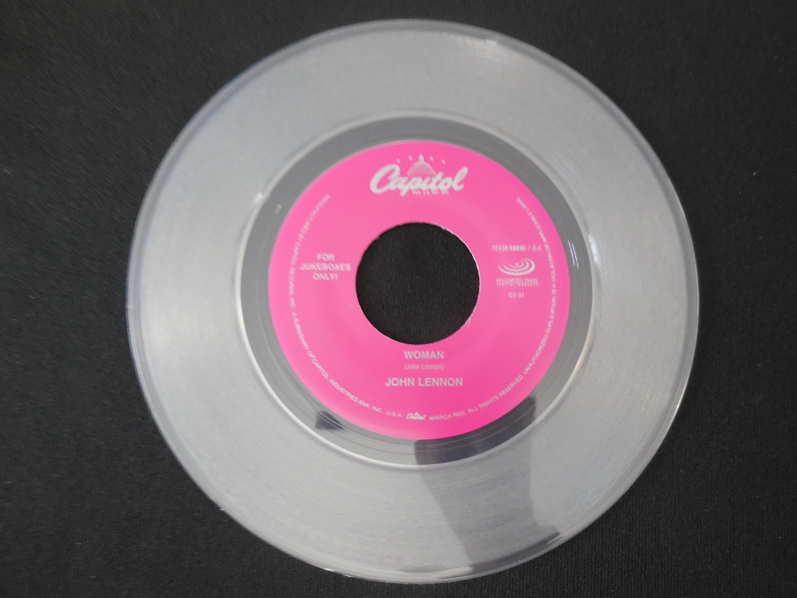 John Lennon-Woman-Clear Vinyl-(Scarce Pink Label) – Very English